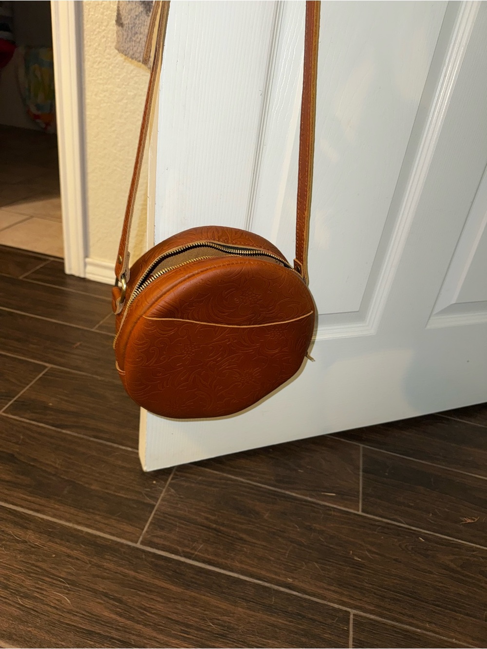 Portland leather Meadow Embossed Round Crossbody Bag
